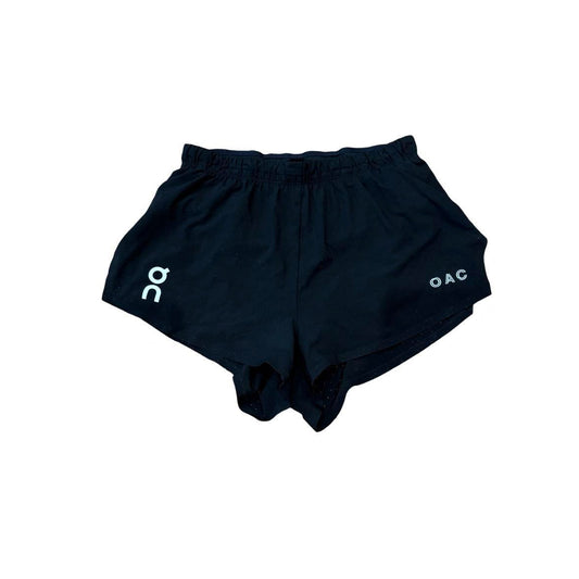 Black shorts with 'OAC' branding on a white background